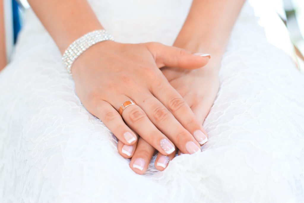 Two hands crossed over